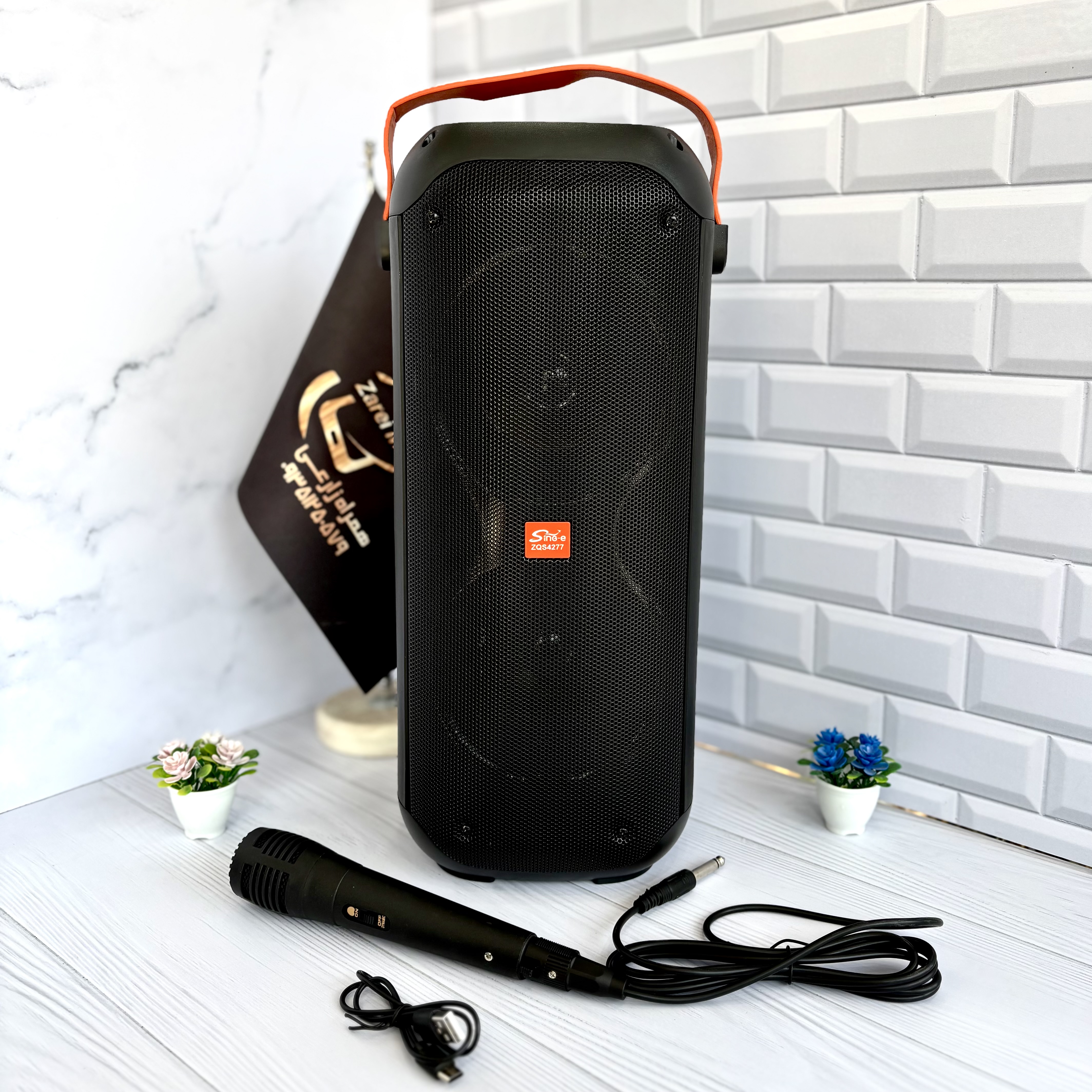 اسپیکر پرتابل شارژی Sing-e با میکروفون سیمی همراه