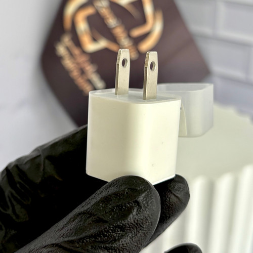 آداپتور اورجینال اپل A1443 با خروجی 5 ولت 1 آمپر مخصوص آیفون و ایرپاد